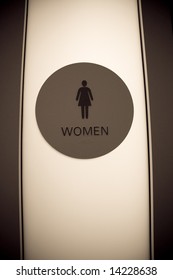 Vertical Image Of Backlit Women's Restroom Sign