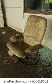 Vertical Image Of A Dirty Old Chair.                               