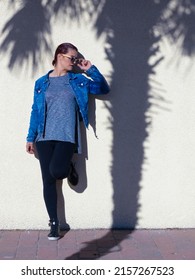 A Vertical Image Of A Young Spanish Woman In An Urban Fashion Shoot