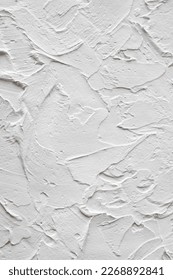 Vertical light wallpaper wall background, textured putty, plaster. Blank space for design.