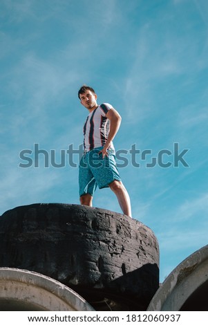 Similar – Image, Stock Photo man climbed a metal tower