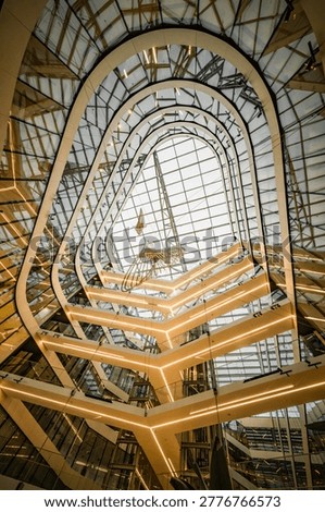 Vertical low angle view looking up through the modern atrium of Roztyly Plaza in Prague