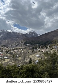 Vertical mountain view with clouds