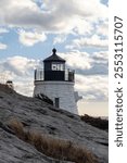 Vertical photo of the Castle Hill Lighthouse in Newport RI