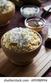 Vertical Photo Of Millet Porridge With Pear And Cottage Cheese