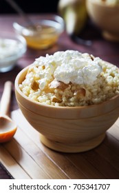 Vertical Photo Of Millet Porridge With Pear And Cottage Cheese