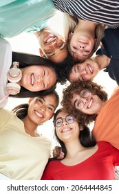 Vertical Photo Of A Multiracial Group Of Friends Taking A Selfie - New Concept Of Normal Friendship With Young People Looking At The Camera And Laughing.