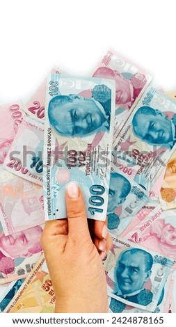 Vertical photo on white background hand with money. Turkish lira in hands. Lots of money. Banner for website, desktop wallpaper, space for copy text and advertising, blank, empty, white, free space
