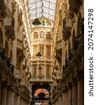 Vertical photograph of the Passage de Lodares, a commercial and residential gallery located in the historic center of the Spanish city of Albacete. Similar to the Italian galleries.