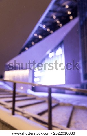 Vertical pic of defocused blurred night city lights bokeh in winter city