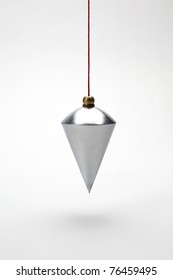 Vertical plumb on white background
