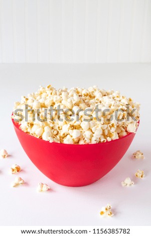 Similar – Striped box with popcorn on yellow background.