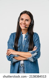 Vertical portrait of young friendly caucasian woman IT support customer support agent hotline helpline worker in headset looking at camera while assisting customer client isolated in white background