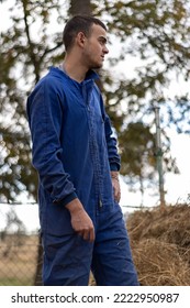 Vertical Portrait Of A Young Rancher On His Work Day