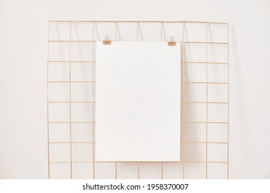 Vertical Poster, Card Mock Up Attached On Gold Grid Board With Binder. White Blank Paper For Prints, Photography, To Do Or Planning List. Natural Beige Colors Wall.