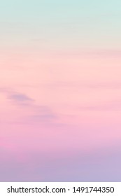 Vertical ratio size of sunset background. sky with soft and blur pastel colored clouds. gradient cloud on the beach resort. nature. sunrise.  peaceful morning. Instagram toned  style - Shutterstock ID 1491744350