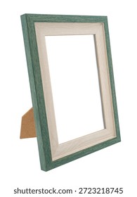 Vertical, rectangular old green wooden tabletop picture frame mockup, vintage style, an concept for displaying posters, photos, painting and gallery, isolated object on white background.
