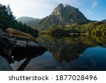 A vertical shot of the amazing landscpaes and a criytally clear water under the blue sky