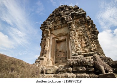 A Vertical Shot Of Angkor Wat Temple Against Blue Cloudy Sky In Angkor Archaeological Park, Krong Siem Reap, Cambodia