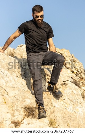 Similar – Image, Stock Photo man climbed a metal tower