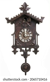 A Vertical Shot Of A Black Forest Cuckoo Clock On White Background