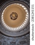 Vertical shot of the canopy of the dome (with the fresco paining of The Apotheosis of Washington) in the United States Capitol rotunda, Washington DC, United States