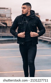 A Vertical Shot Of A Cool Stylish Pakistani Male Posing In A Street