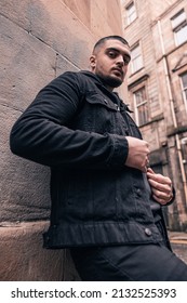 A Vertical Shot Of A Cool Stylish Pakistani Male Posing In A Street