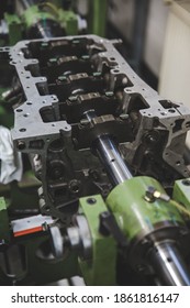 A Vertical Shot Of A Dimension Aluminum Automotive Parts In An Industrial Factory