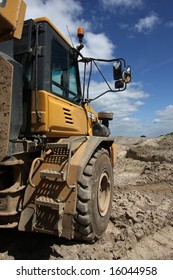 Vertical Shot Of A Dumper Truck In A Quarry Environment.