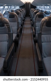 A Vertical Shot Of The Empty Airplane Aisle 