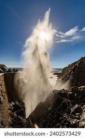 A vertical shot of the exploding La Bufadora blow hole in Ensenada, Mexico