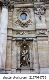 A Vertical Shot Of The Facade Of The Bourse (stock Exchange) Historical Building In Brussels, Belgium