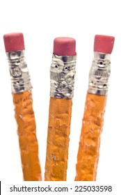 Vertical Shot Of Group Of Chewed Pencils Showing Stress Or Boredom