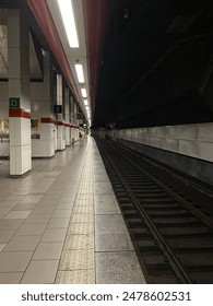 A vertical shot inside an empty subway station