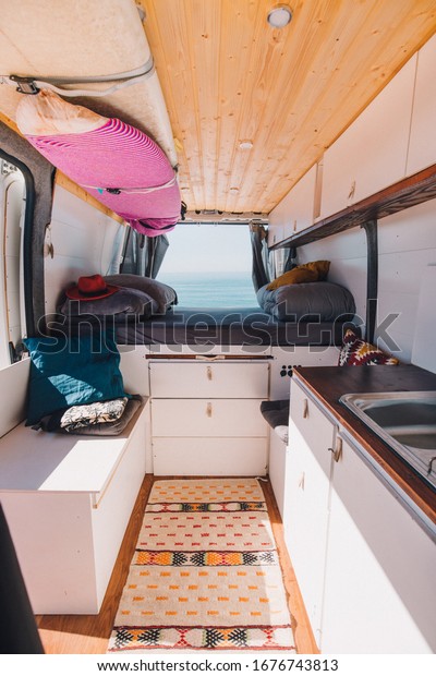 A vertical\
shot of the inside of a small\
van