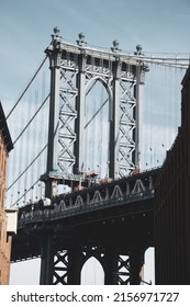 A Vertical Shot Of A  Manhattan Bridge In New York City, USA