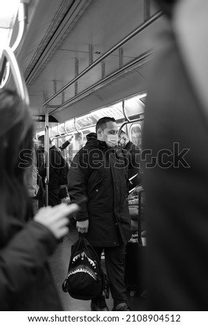 Similar – Image, Stock Photo sitting in a subway to central amsterdam