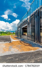 Vertical Shot Of A New Commercial Building Under Construction.