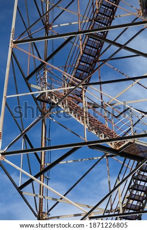 A vertical shot of the Olson Tower steps under a blue sky in West Virginia