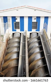 A Vertical Shot Of A Pair Of Screw Conveyors