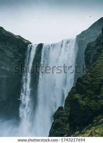 Similar – Waterfall in Iceland in cloudy weather