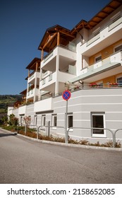 Vertical Shot Of Street View Of Housing In Small Mountain Town