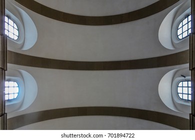 Vertical shot of vaulted ceiling with side windows