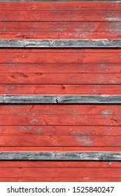 Vertical Shot Of A Weathered Red Barn Side With Horizontal Lines