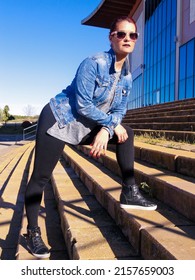 A Vertical Shot Of A Young Woman In An Urban Fashion Shoot