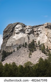 Vertical Side view of Mount Rushmore with sunlight