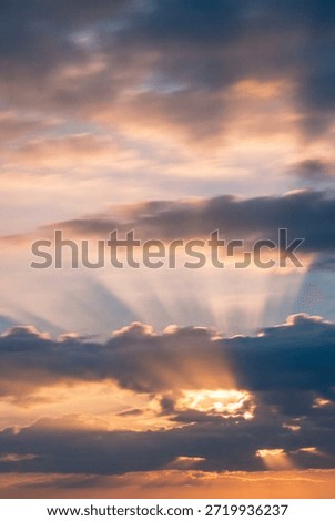 Vertical sky background with layered clouds and dramatic natural light. Peaceful atmosphere with cinematic realism.