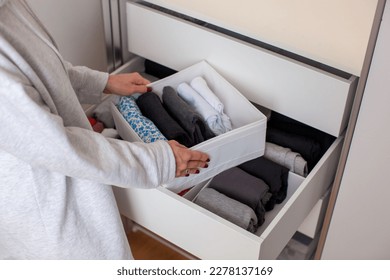 Vertical storage of clothing. Clothing folded for vertical storage in the linen drawer. Nursery. Room interior.  - Shutterstock ID 2278137169