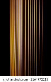 vertical straight yellow fresh line graphic pattern on dark black background